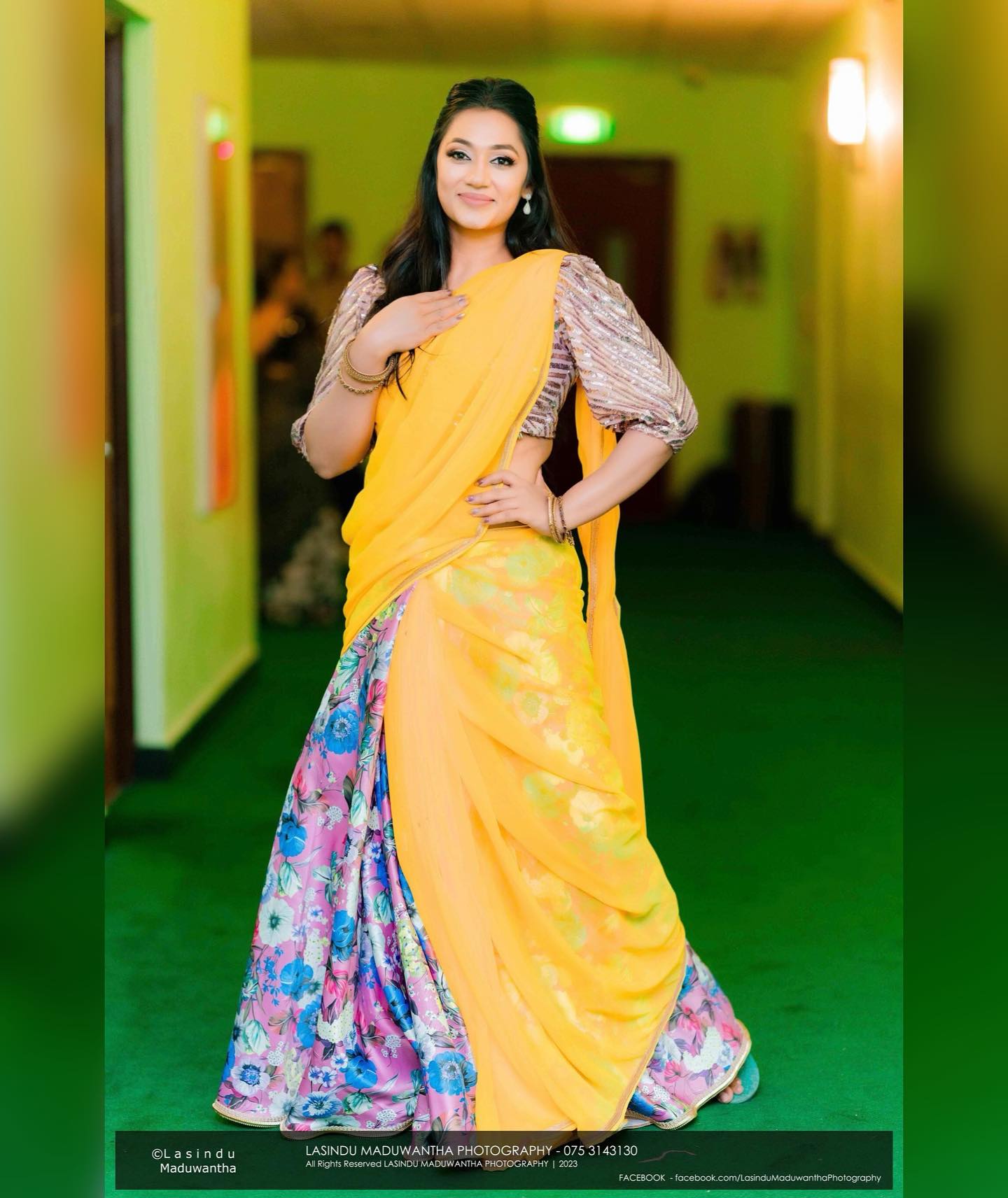 Upeksha in a yellow sari